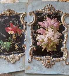 an old book with flowers painted on it