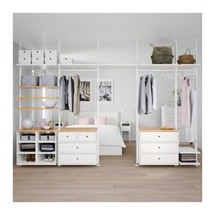 a bedroom with white shelving and wooden floors