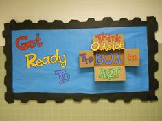 a bulletin board that says get ready outside the box