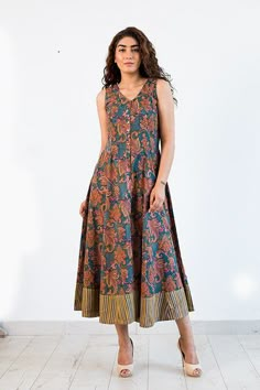 A long panel dress in a beautiful  paisley block print cotton Malmal fabric which is just right for any occasion.The beauty of the print design is in the use of over six color block and the finesse of execution of the print by the craftsman.  Wear it with wedge heel sandals & stone jewelry , it creates a classic elegant look for Resort wear or to meet up with friends !  One of our most popular style loved by all for it's feminine and comfortable cut !  100% cotton hand block print with Rapid dye Block Print Cotton Dress, Panel Cut Kurti, Cotton Summer Dresses For Women, Simple Cotton Dress, Frocks And Gowns, Ikkat Dresses, Cotton Short Dresses