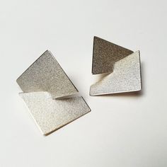 Modern Silver Geometric Jewelry, Architecture Jewelry, Elegant Silver Geometric Earrings, Architectural Jewelry Design, Dc Jewelry, Luxury Minimalist Sculptural Jewelry, Luxury Modernist Pierced Earrings, Luxury Contemporary Sculptural Earrings, Architectural Earrings