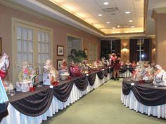 a banquet hall with tables covered in candy and candies