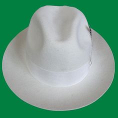 This fedora hat is beautifully crafted in white color with intricate detailing. For adding beauty to your fashion, this grand hat is the best choice. This pulchritudinous hat that is crafted of superb quality wool material will be your casual occasion partner. An accessible cost, high-quality hat that suits both men and women!

Specifications
Item Type: Fedoras
Department Name: Adult
Pattern Type: Solid
Gender: Unisex
Style: Formal
Material: Wool
 Shipping

This product ships from China in 3 to White Fedora With Curved Brim, White Adjustable Panama Hat For Formal Occasions, White Panama Hat With Curved Brim, Classic White Flat Brim Hat Bands, White Brimmed Fedora For Kentucky Derby, Classic White Wide Brim Fedora, Classic White Panama Hat With Curved Brim, White Fedora For Formal Summer Occasions, White Fedora For Formal Summer Events