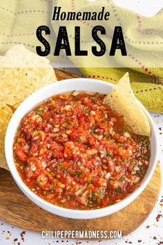 homemade salsa in a white bowl with tortilla chips on the side and text overlay