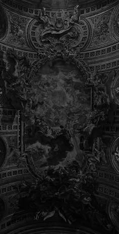 an ornate ceiling with many paintings and designs on the ceiling, in black and white