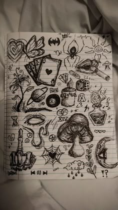 a sheet of paper with drawings on it and some other things in the background that are drawn