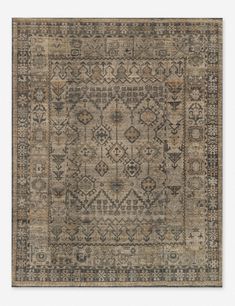 an area rug with different colors and patterns on it, including beiges and browns