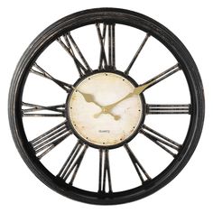 an old clock with roman numerals is shown in black and gold color scheme