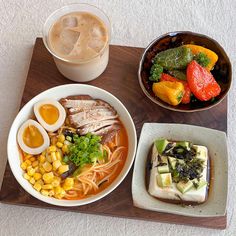 there are many different foods on the tray