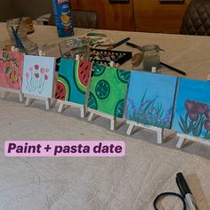 several paintings are displayed on easels with the words paint + pasta date