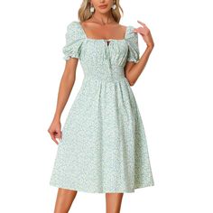 This is a description of a Floral Dress for Women that features a Square Neck, Puff Sleeves, Midi Length, Smocked design, and a beautiful Floral Pattern. The casual dress is adorned with smocking details and comes with puff sleeves and ruffled cuffs, adding a sweet touch to its overall design. You can wear this dress with your favorite high heels or sandals and enjoy a cool summer day. The dress is a good choice for your wardrobe, as floral prints are always on-trend. The dress is designed to ha Beach Dresses Summer Casual, Blue Colour Dress, Smocked Dresses, Sweater Maxi Dress, Beach Dresses Summer, Mini Skater Dress, Green Floral Dress, Suspender Dress, Chiffon Long Sleeve