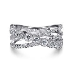 an elegant wedding ring set with three rows of diamonds