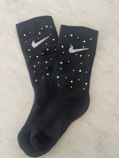 Elevate your sock game with our dazzling custom Nike rhinestone socks. Each pair is meticulously crafted to blend comfort with glamour, featuring premium quality Nike socks adorned with sparkling rhinestones. Perfect for adding a touch of personalized style to your everyday wear or making a statement at special events. Whether you're looking for a unique gift or treating yourself to something special, our custom designs and attention to detail ensure socks that shine in every way. Explore our co Nike Rhinestone, Nike Socks, Custom Nike, Sock Game, Custom Nikes, Kids Socks, Leg Warmers, Something Special, Special Events