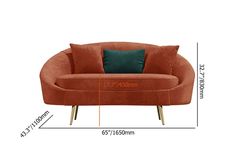 an orange couch with green pillows and measurements