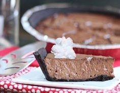 a slice of chocolate pie with whipped cream on top