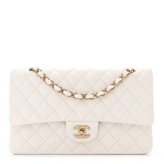 This is an authentic CHANEL Caviar Quilted Medium Double Flap in White. This stunning shoulder bag is crafted of diamond quilted luxurious caviar leather in white. The bag features polished light gold chain link leather threaded shoulder straps, a rear patch pocket, and a facing polished light gold Chanel CC turn lock. This opens to a matte white leather interior with patch pockets. Rainbow Boys, Classic Phones, Chanel Double Flap, Chanel Flap Bag, Denim Quilt, Light Backpack, Gold Chanel, Chanel Shoulder Bag, Chanel Caviar