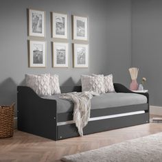 a day bed with pull out trundle in a living room