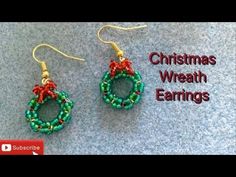 christmas wreath earrings made with beads and beading on the side of a gray carpet