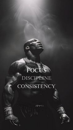 a black and white photo of a man with the words focus, discripe, constistency