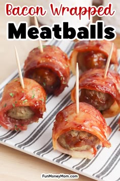 bacon wrapped meatballs on a plate with toothpicks in the middle and text overlay that says bacon wrapped meatballs