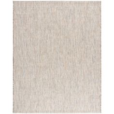 a white rug with small squares on the bottom and one square in the middle, against a