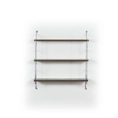 three shelves are hanging on the wall and one shelf has two metal bars attached to it