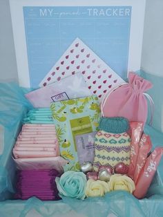 a gift box filled with lots of different types of items in it's wrapper