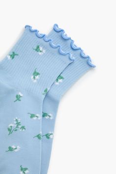 Pair of knit crew socks featuring an allover floral print, partial ribbed construction, and lettuce - edge trim. | 94% polyester, 4% other fibers, 2% spandex | Machine wash cold | Floral Print Crew Socks Crew Socks, Lettuce, Floral Print, Floral Prints, Socks, Spandex, Trim, Collage, Knitting