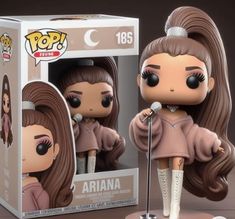 a pop vinyl figure is shown in front of a box with an image of aria on it