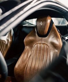 the interior of a car with leather seats