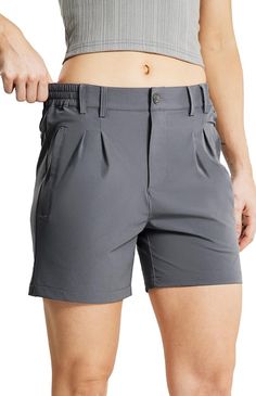 PRICES MAY VARY. Quick Dry & Water Resistant - The Haimont Pleated Hiking Short is a classic silhouette made of ripstop nylon spandex blend, which offers a lightweight, quick dry, breathable keep you cool and dry. Durable Water Repellent finish to repel light rain Free Movements - The hiking shorts for women uses Soft and Stretchy fabric. Four-way stretch woven fabric deliver versatile comfort for dynamic activity Functional Shorts - 4 zipper pockets keep important items securely nearby. Front p Nylon Shorts, Hiking Shorts, Light Rain, Shorts For Women, Classic Silhouette, Stretchy Fabric, Water Repellent, Quick Dry, Woven Fabric