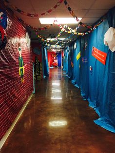 the hallway is decorated with dr seuss's decorations and streamers on the walls