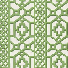 a green and white wallpaper pattern with geometric designs on it's sides, all in different sizes