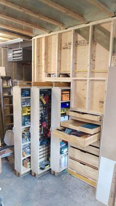 the inside of a storage room with lots of drawers and shelves on each side of the door