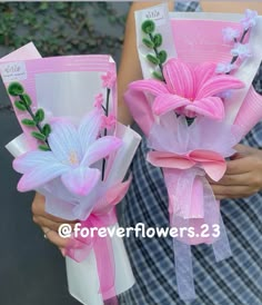 two women holding pink and white flowers in their hands with the words foreverflowers on them