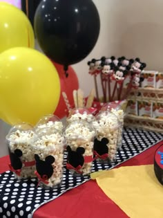 a mickey mouse themed birthday party with popcorn