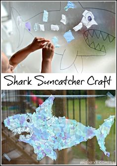 a child's hand is making a shark suncather craft