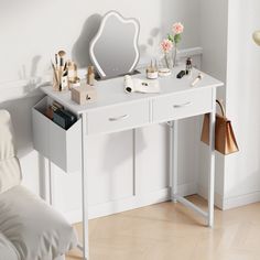 a white dressing table with drawers and a mirror on the top, next to a chair