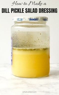 a jar filled with liquid sitting on top of a counter