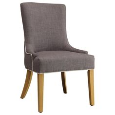 a gray chair with wooden legs and a grey upholstered back rest on an isolated white background