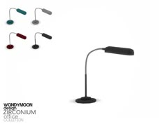 an image of a desk lamp with three different colors on the light and one is black