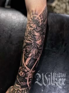 a person with a tattoo on their arm