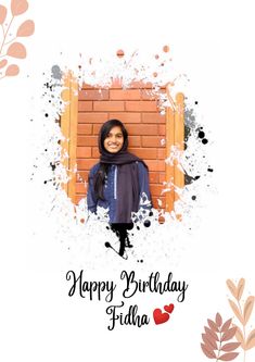 a woman standing in front of a brick wall with the words happy birthday friday written on it