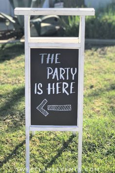 a sign that says the party is here