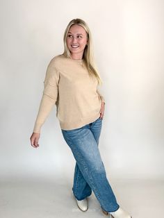 This cozy sweater, in a soft oatmeal, offers a timeless look that’s easy to dress up or down. Wear it alone for a simple, chic outfit, or layer it under a vest or flannel for added warmth and style. Available in small, medium, large, & extra large Color: Oatmeal Emily is 5'6" and has a 34c bust. She is wearing a medium. Runs true to size Ribbed round neckline Ribbed cuff and hem Paired here with our Megan Mid Rise Raw Hem Wide Leg Denim Simple Chic, Chic Outfit, Cozy Sweater, Wide Leg Denim, Guinea Bissau, British Indian, Cozy Sweaters, Mozambique, Crewneck Sweater