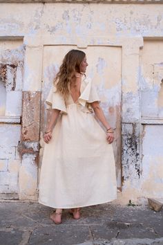 Raw Eri Ahimsa silk dress with drawstring and deep neck in beige colour. Soft and light fabric with rustic texture. Perfectly fitting sizes from S to M. Open back makes it a best dress for warm summer days and nights. Also can be worn for a special occasion, as a wedding dress. It has a loose, maxi silhouette below the drawstring and can be used as maternity dress or feeding dress. Dress has a double layer of lining in top and skirt to avoid transparency. This beautiful dress made from raw Eri s V-neck Dress With Back Tassel Tie-up For Summer, V-neck Maxi Dress With Natural Dye For Summer, Summer Festival Dresses With Back Tassel Tie-up, Bohemian V-neck Dress With Natural Dye, Flowy Festival Dress With Natural Dye, Flowy Natural Dye Maxi Dress For Spring, Flowy Spring Maxi Dress With Natural Dye, Bohemian V-neck Silk Dress, Flowy Natural Dye Dress For Vacation