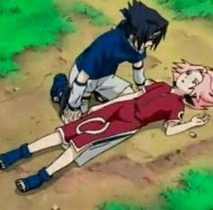 an anime scene with two people on the ground and one person laying down in the dirt