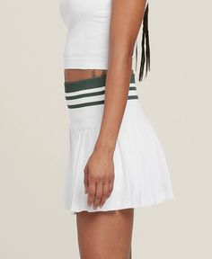 Midtown Tennis Skirt | Wilson Sporting Goods Sporty White Stretch Pleated Skirt, Sporty Mini Skirt With Built-in Shorts For Tennis, Sporty Relaxed Pleated Skirt, Sporty Pleated Skirt With Lining, Sporty Relaxed Fit Lined Pleated Skirt, Summer Sports Tennis Dress With Lined Skirt, Athleisure Mini Tennis Skirt With Lining, Stretch Pleated Tennis Dress For Sports, Stretch Tennis Dress With Pleated Skirt For Sports