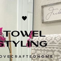 towel styling for the bathroom with text overlaying it that reads towel styling overcraftedhome