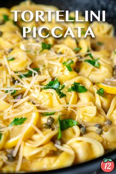 tortellini piccata with olives and parmesan cheese in a skillet